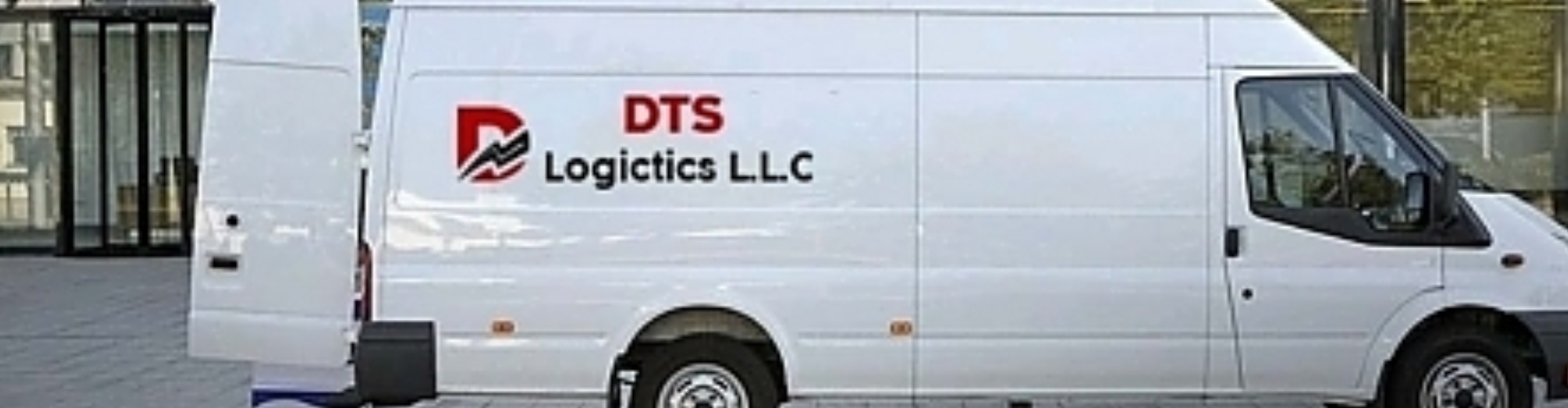 White van tire close-up showcasing maintenance by DTS Logistics