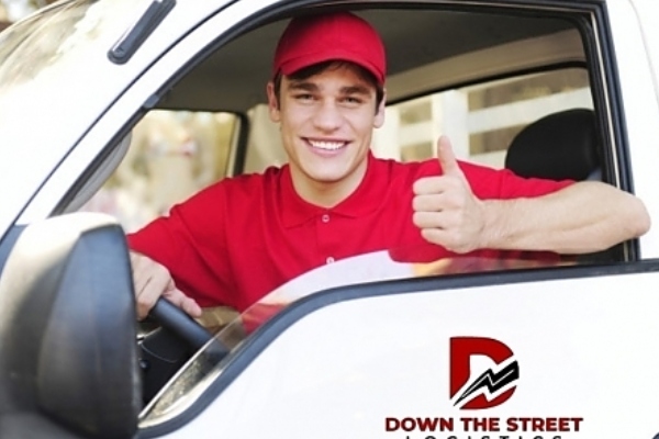 Focused driver in red cap navigating Phoenix streets